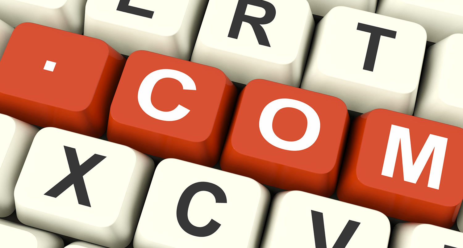 The .com top-level domain spelled out on red keys on a keyboard surrounded by white keys